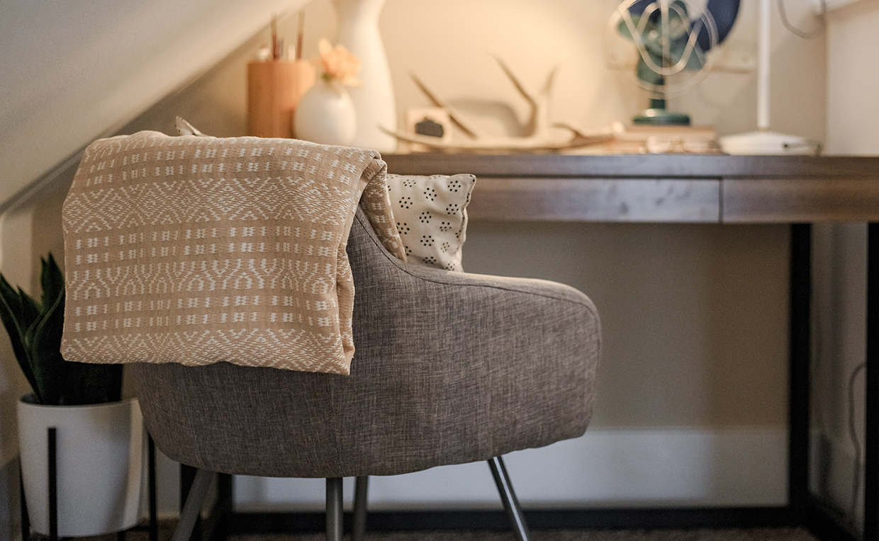 Chair and desk with blanket, pillow