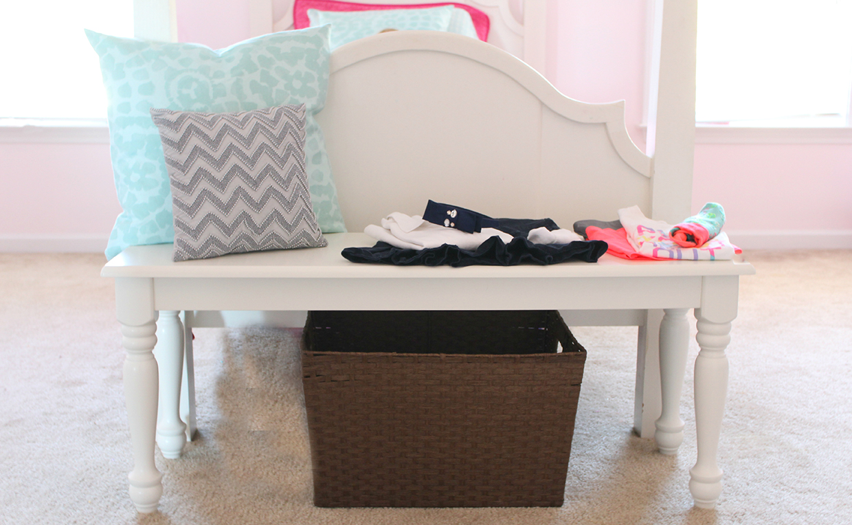 bench at the foot of the bed for seating, storage